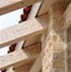 Large beam processed wood roof in white with open colonnade