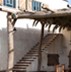 natural wood pergola , open roof and cider blinds 